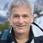 Headshot of Caucasia man with short gray hair